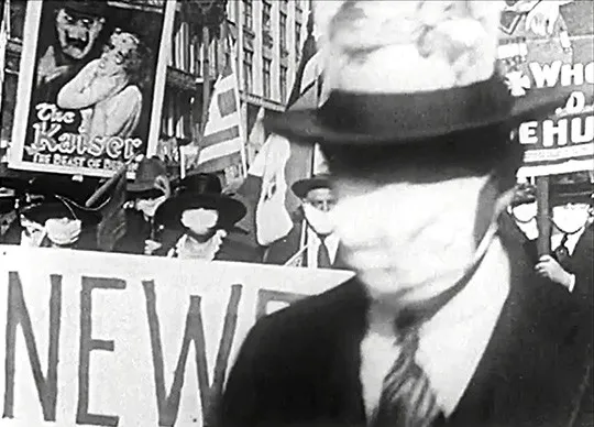 Archival photograph of a 1917 suffrage-era street parade